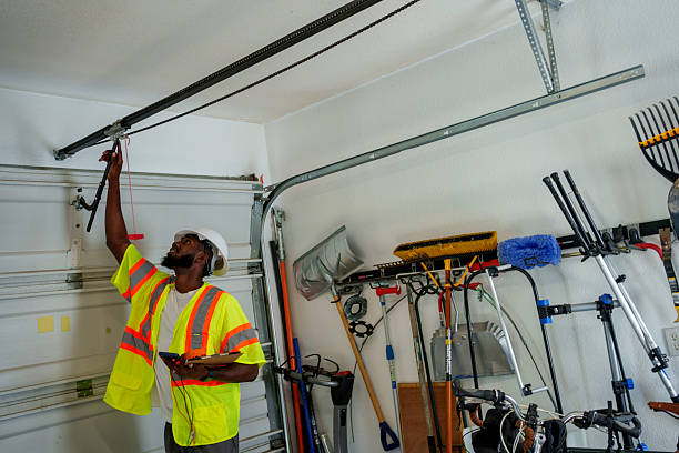 Professional Garage Door Panel Replacement technician working in Williston Park, NY